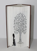 Livre arbre avec un chien et un chat