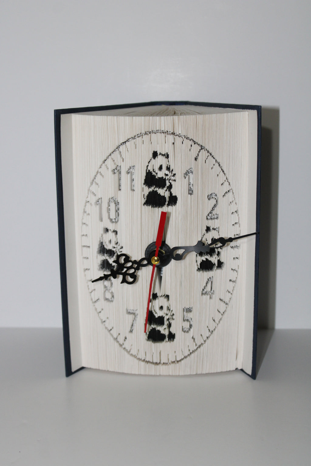 Livre pendule panda