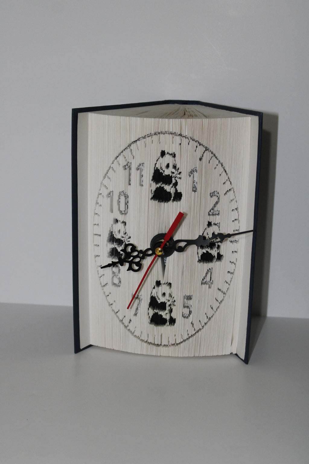 Livre pendule panda