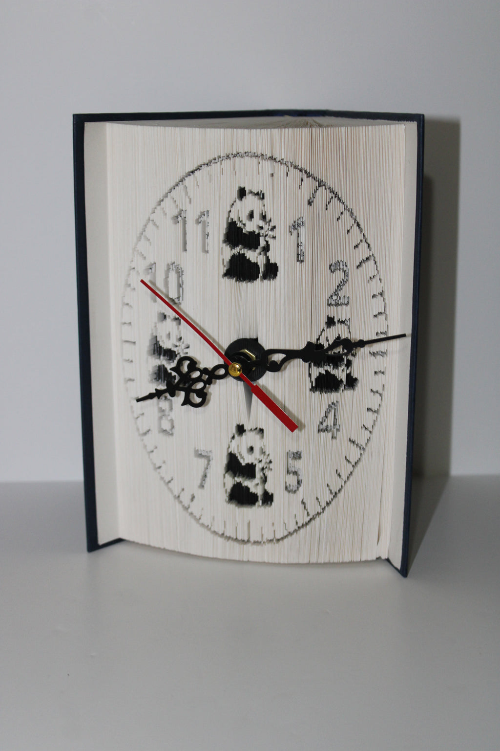 Livre pendule panda