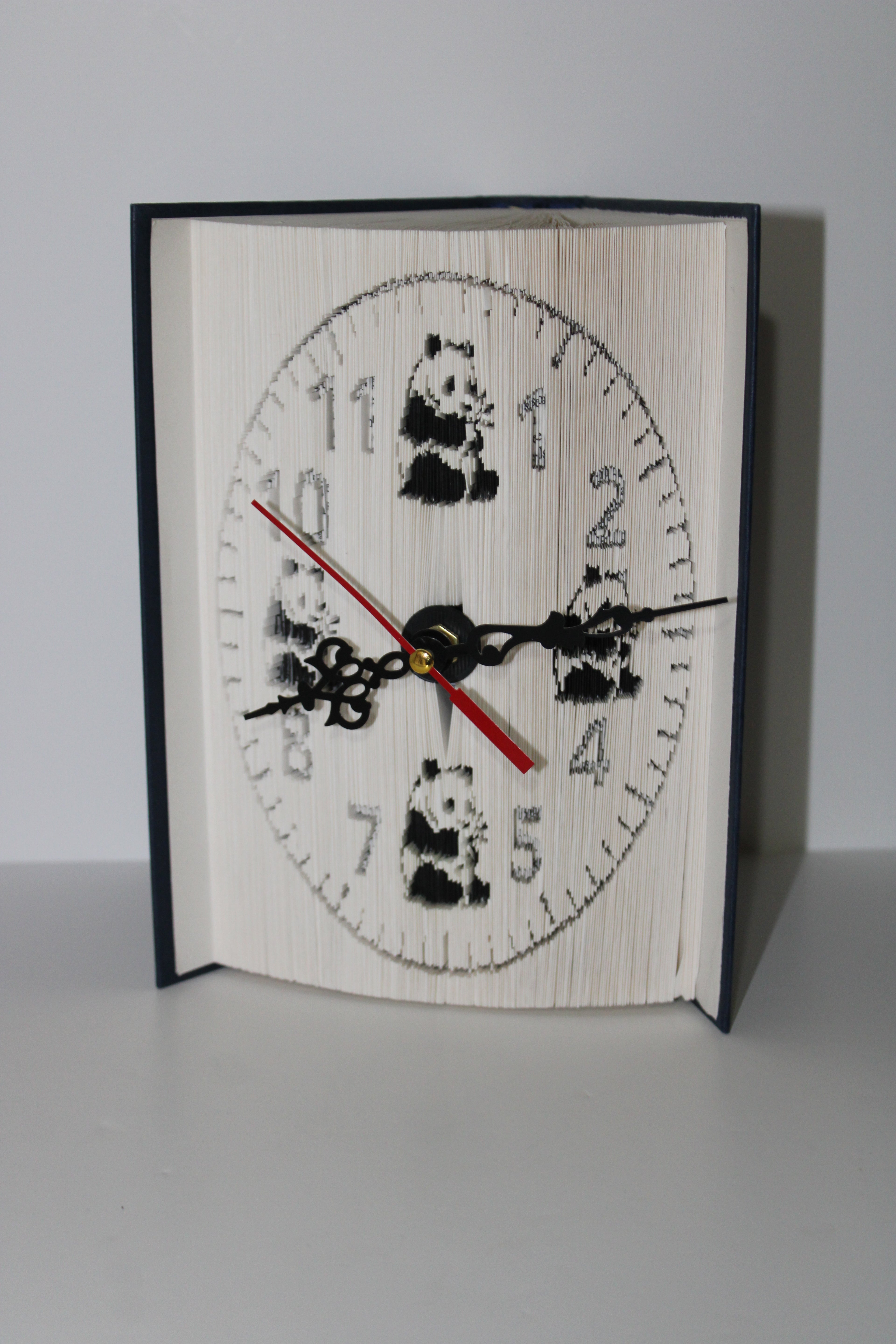 Livre pendule panda