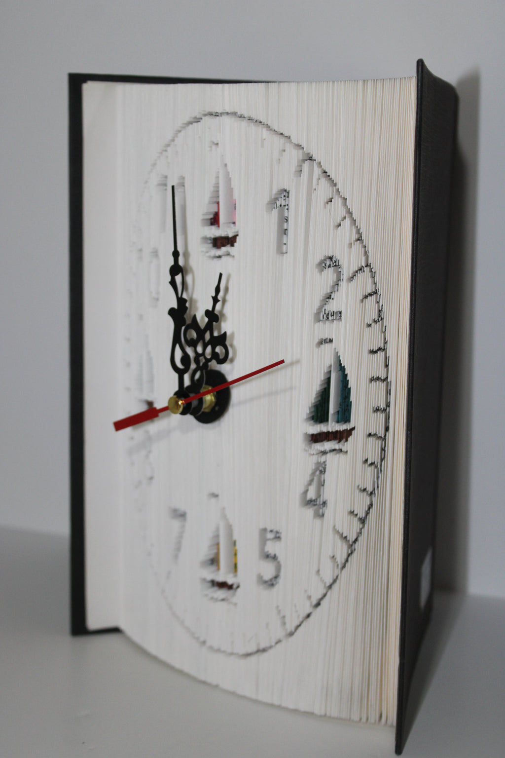 Livre pendule voiliers en couleur
