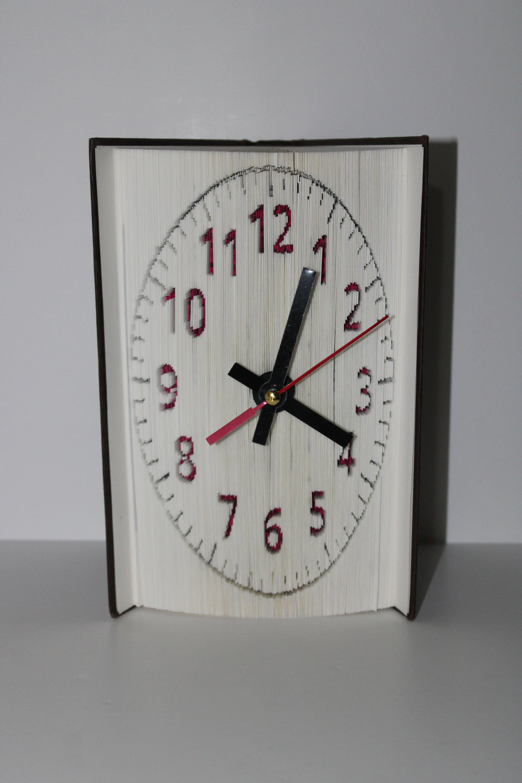 Livre pendule chiffres rose