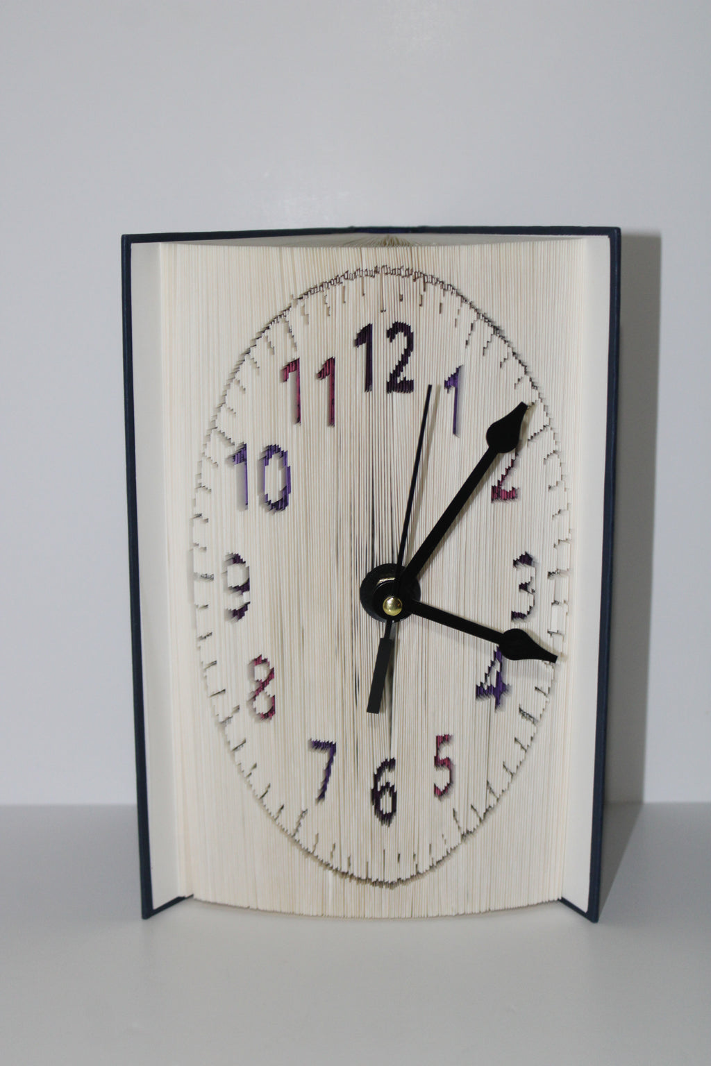 Livre pendule chiffres multi couleur