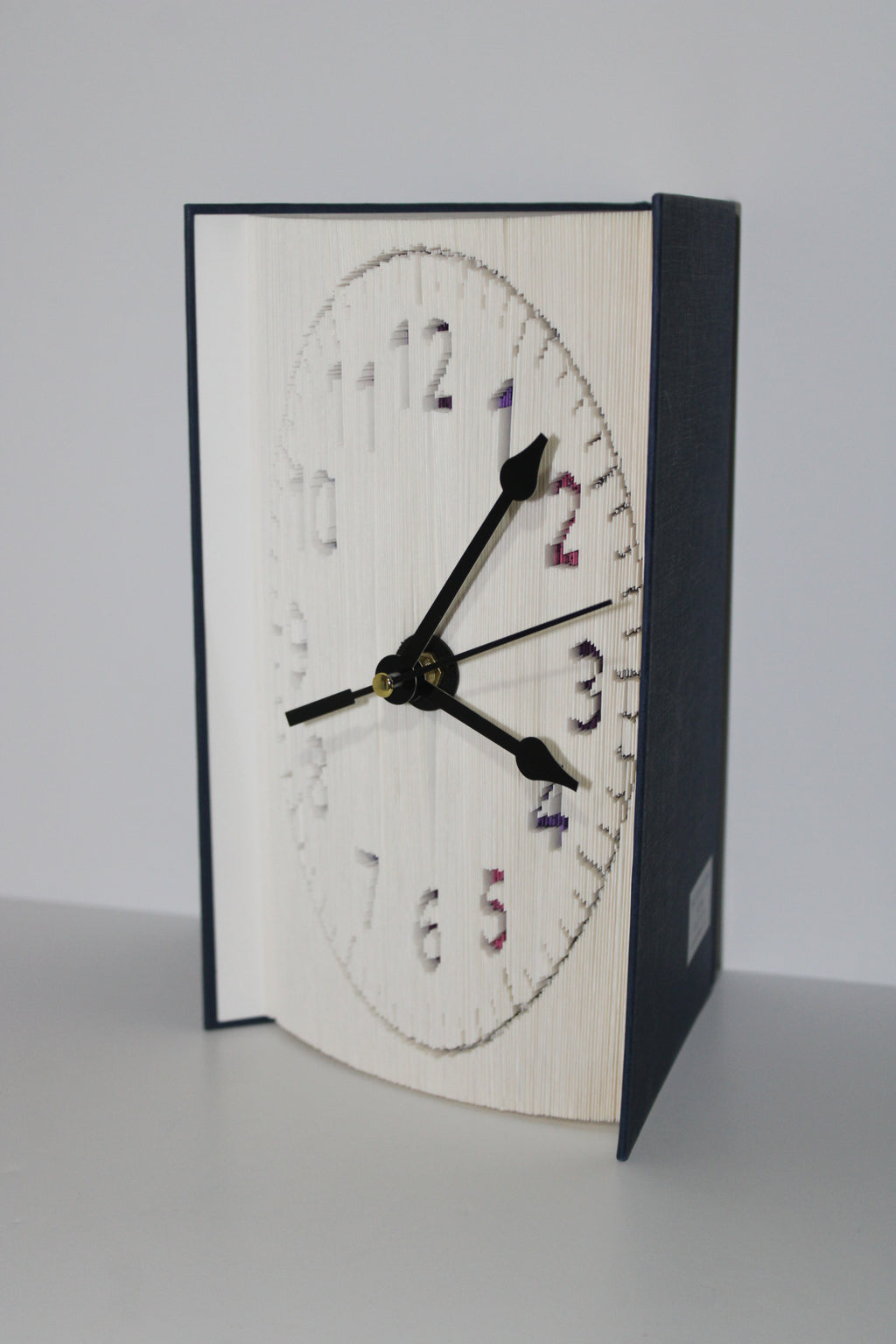 Livre pendule chiffres multi couleur