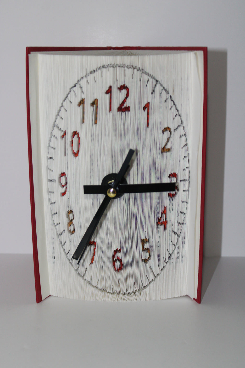 Livre pendule chiffres orange