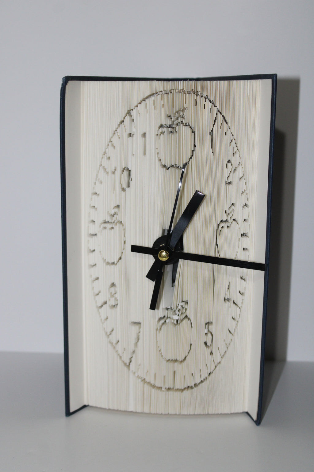 Livre pendule pommes